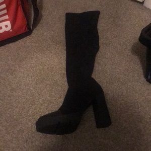 Black over the knee heeled boots suede upper toe has leather design
